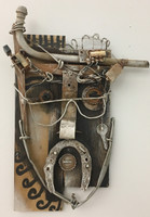 Carlos César Román, Untitled, 2015. Wall sculpture from found objects 14" x 9"
