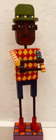 Jose Fuster, “Músico,” 2025. Acrylic on wood. 20” x 4.5” x 4” #5270K