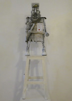 Carlos Cesar Román #6218. "White Warrior," 2015. Mixed media: wood, metal, paper. 53 x 13 x 8.5 inches.