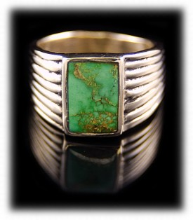 Orvil Jack Turquoise in a gold ring