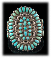 A large Vintage Navajo Turquoise Cluster Bracelet