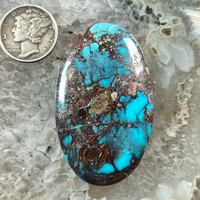 Excellent smoky Bisbee Turquoise with chocolate brown and quartz matrix