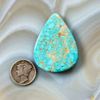 Large bold and authentic number eight spiderweb turquoise cabochon