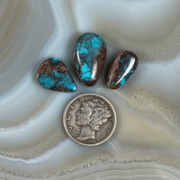 Three Smokey Bisbee Turquoise Gemstones