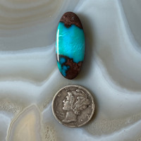 Very attractive Bisbee with chocolate brown matrix cabochon