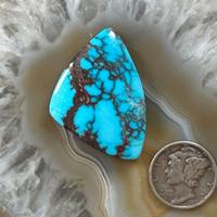 A stunning Bisbee Spiderweb Turquoise Gemstone