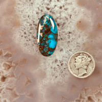 Oval smoky Bisbee Turquoise with quartz inclusions
