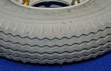 TENNANT-CASTEX NOBLES TIRE AND RIM ASSEMBLY 1059452