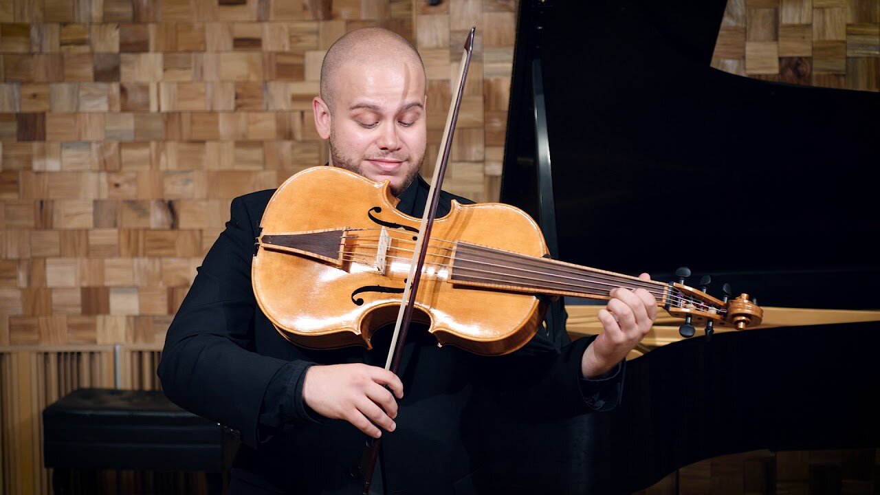 andrew-gonzalez-on-vioncello-da-spalla-by-don-rickert.jpg
