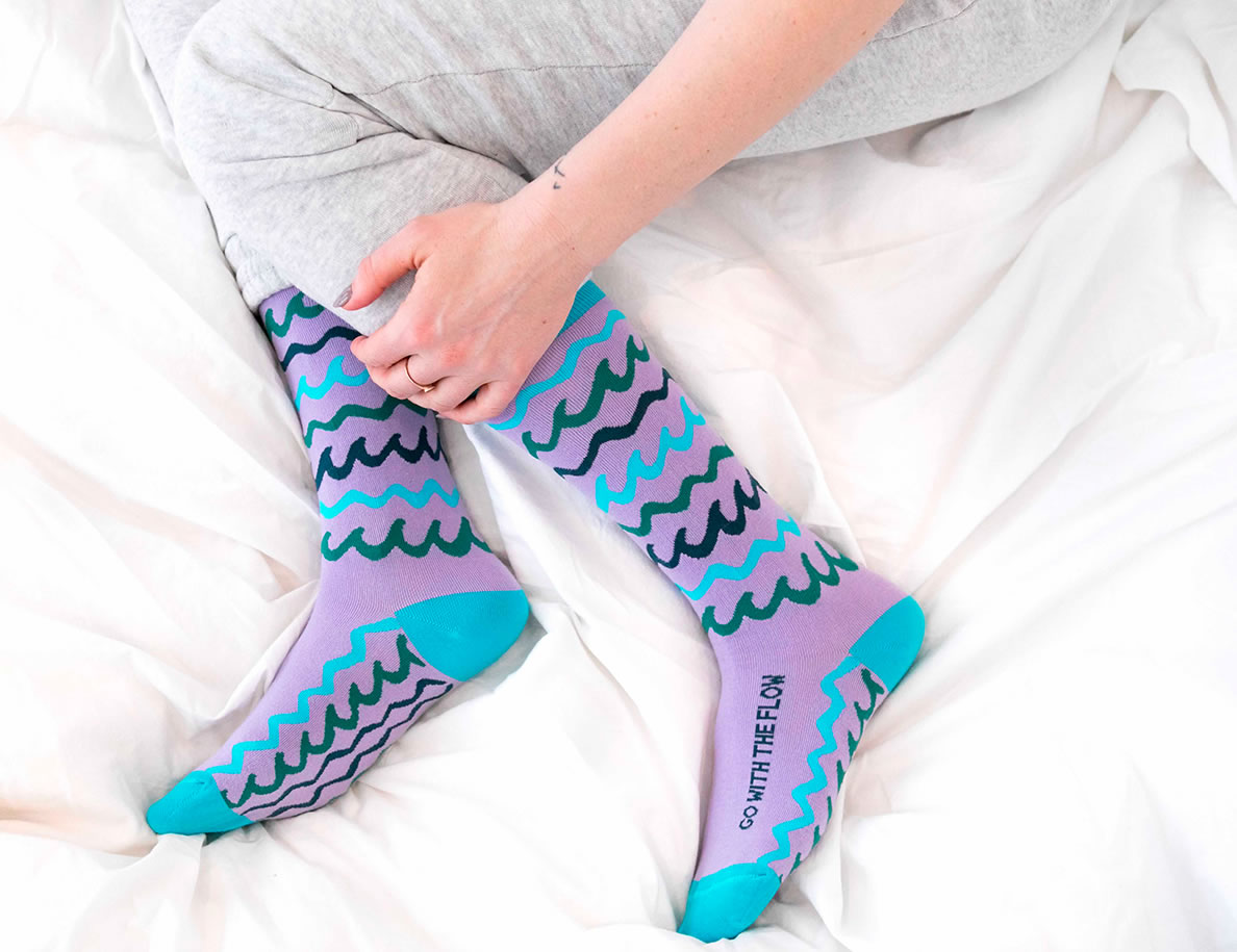 Colorful, modern women's socks with inspiring words by Posie Turner