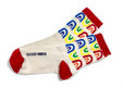 Good Vibes rainbow socks by Posie Turner. Socks with good words.