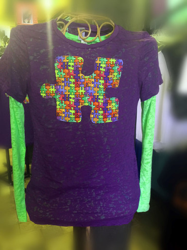 Autism Awareness Burnout shown layered over a Lime Long-Sleeve Burnout