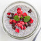 Vanilla chia pudding topped with freeze dried strawberries and dark chocolate
