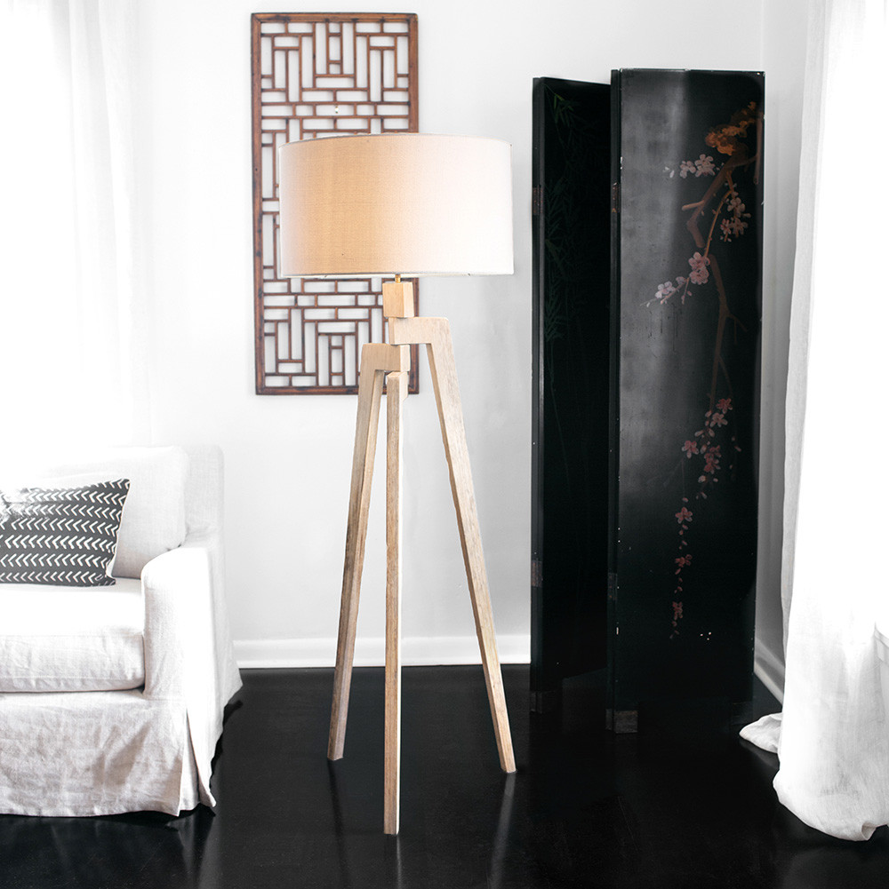 Touba Tripod Floor Lamp
21 dia x 60 H inches
Frake wood, Linen Shade Touba Tripod Floor Lamp
21 dia x 60 H inches
Frake wood, Linen Shade