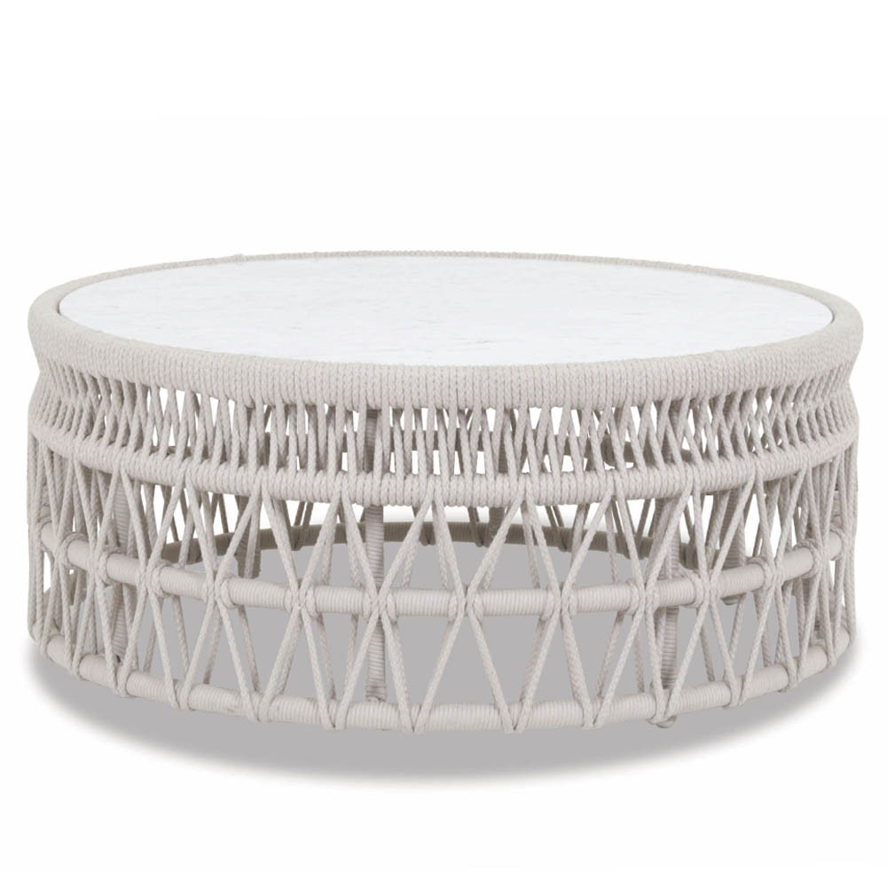 Dana Coffee Table
41 dia x 18 H inches
Powdercoated Aluminum Frame, Rope, Carrara Stone
Dana Coffee Table
41 dia x 18 H inches
Powdercoated Aluminum Frame, Rope, Carrara Stone
