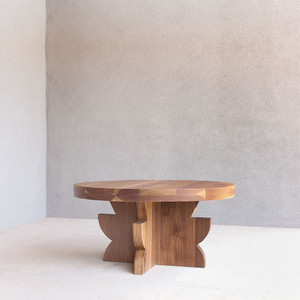 Tozi Walnut Cocktail Table
36 dia x 18 H inches
Walnut