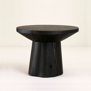 Monolith Center Table
36 diameter x 30 H inches
Ebony