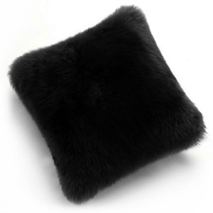 As Shown: Genuine Sheepskin Pillow
Size: 14 x 14 inches
Material: Black Sheepskin

Description: Tossing these naturally luxurious pillows of brushed New Zealand longwool sheepskin simply won’t happen. You’ll be too entranced by their soft cuddle to let them leave your side. A fabric back matches each of the four colors and six sizes.