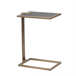 As Shown: Deco Drink Table
Size: 10 x 14.5 x 20.5 H inches
Material: Steel with Bronze Finish, Leather