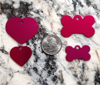 Beautiful hot passionate pink brushed aluminun Pet ID tags available in Large Bone, Large Heart, Small Bone and Small Heart.  We recommend the small tags for cats and small dogs under 40 pounds.  Tags can be engraved on both sides.  3 lines maximum per side makes the id tag readable and will get your pet home safely with clear contact information.  The fewer the letters, the bigger they will be.  Tags with name on the front and phone numbers on the back look the best. We can engrave these same day and ship next day. As always SHIPPING IS FREE inside the USA!