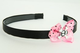Skull cross eye black light pink bow & skull