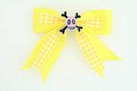 Yellow / skull cross eye pink yellow skull