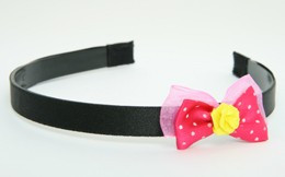 DP flower yellow dark pink bow & flower
