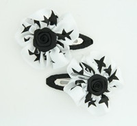 Star white-black flower hair clips pair