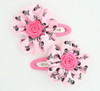 Skull L.pink flower hair clips pair