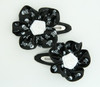 Skull black flower hair clips pair