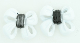 C bow double white colorful stud