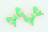 C bow cross green colorful stud