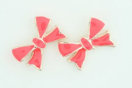 C bow cross pink colorful stud