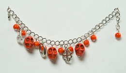 Skull full orange skull bracelet