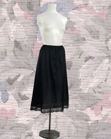 Sophisticated black tea length half slip