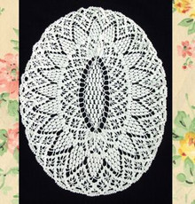 Pretty oval crocheted doily