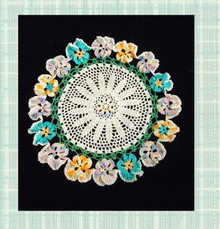 Unusual doily with colorful pansies