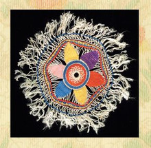 Woven silk doily