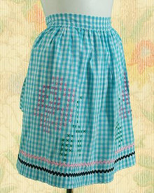 Happy cross-stitched apron