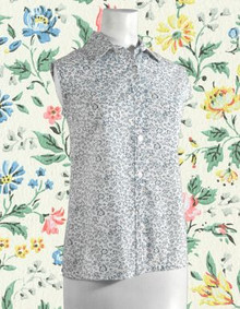 Blue and white floral sleeveless blouse