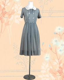 Navy 1950s dress with white polka dots