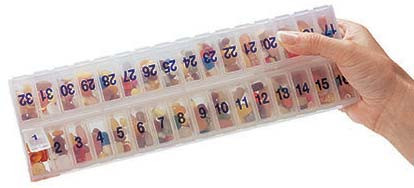 32-Day, 1 Compartment Per Day Medication Organizer filled with pills.