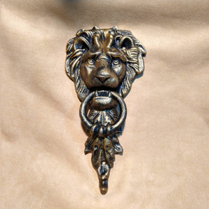 antique gold cast iron lion door knocker