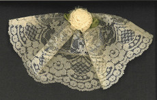 Ivory Lace Headcovering With Carnation