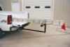 Universal Fit Extend-A-Truck Ladder used as a bed extension for a long ladder (ladder not included