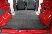 Covers cargo area behind front seats to rear doors.