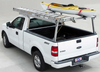 Galleon Aluminum Overhead Stake Pocket Truck Ladder Rack shown mounted without a tonneau cover and carrying cargo (ladder and canoe NOT included) - Standard Model