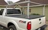 This is the Tall, Extra WideSchooner Aluminum Tonneau Stake Pocket Truck Ladder Rack mounted on a Ford Super Duty with a sectional tonneau cover (not included)  showing the straight leg design.