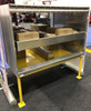 Rear view of the Westin Cargo Van Rear Sliding Shelf Organizer on a display stand (boxes not included)