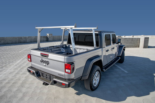 Model 6 - Clipper Ladder Rack Kayak Rack For Jeep Gladiator Trucks sits above cab height and has brushed aluminum crossbars & legs with a bead-blasted stainless steel base.